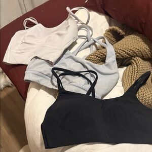 Set of Three lululemon sports bras - Black, White, Gray